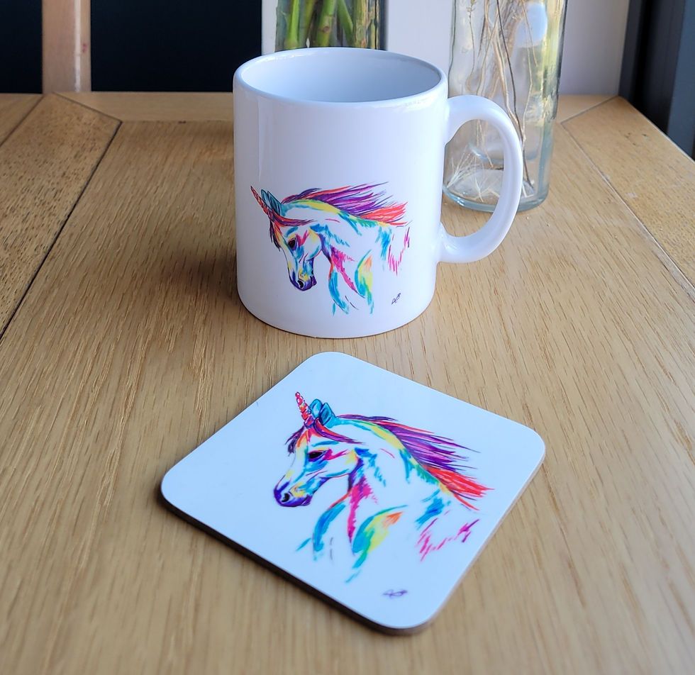 Thumbnail: A unicorn mug and matching coaster. A rainbow unicorn on a white background.