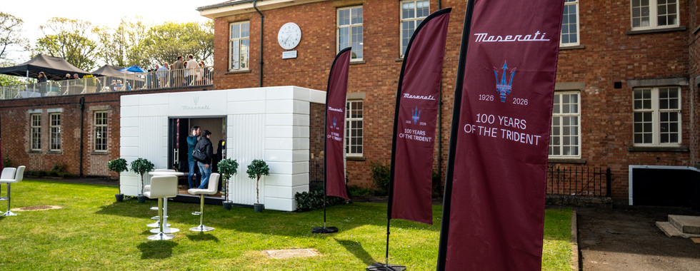 Premium event lounge hire unit branded for Maserati at Bicester Heritage Scramble April 2026