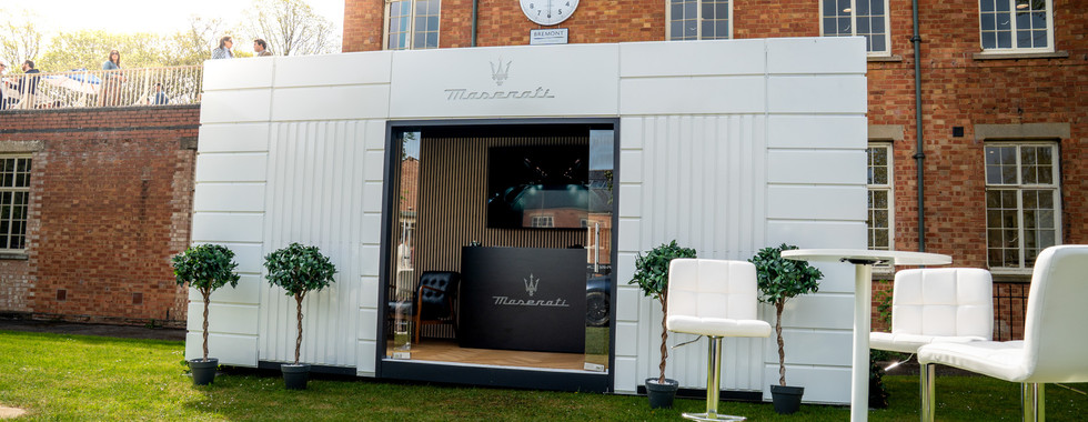 Premium event lounge hire unit branded for Maserati at Bicester Heritage Scramble April 2026