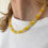 Miniature : 4 CROSSES • Collier jaune 