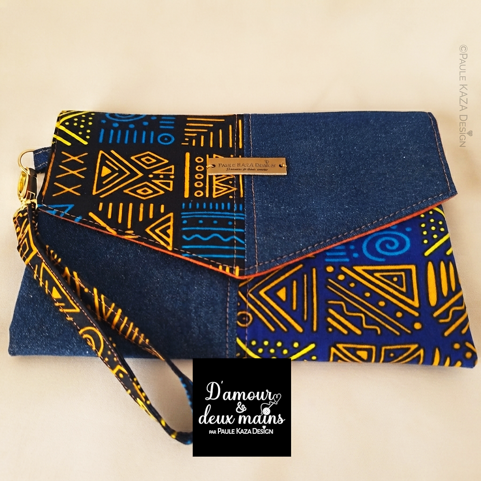 pochette enveloppe en jean et wax motifs bogolan bleu et orange - depuis paulekazadesign.com