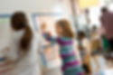 Elementary Students Drawing on a Whiteboard.jpg