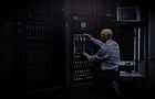 hes-wellversed-all-things-it-rearview-shot-it-technician-repairing-computer-data-center_ed