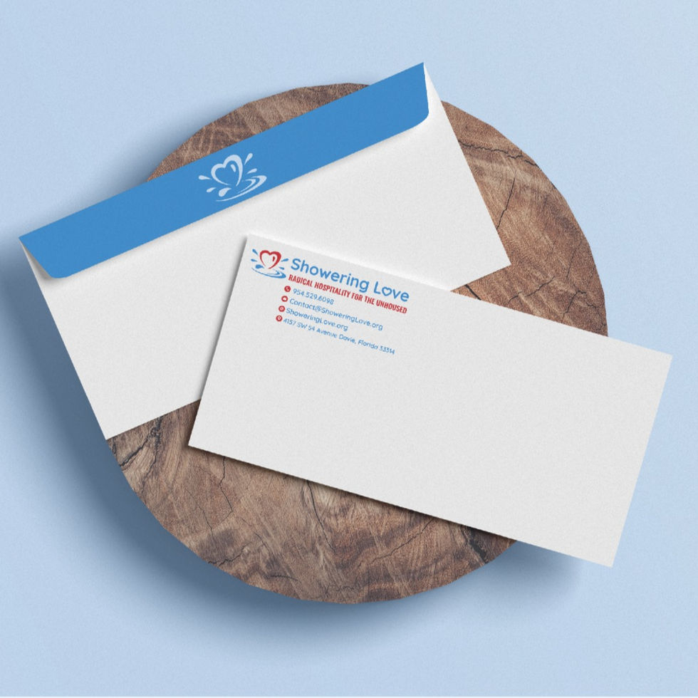 Branded Showering Love envelope with logo and return address for nonprofit communications.