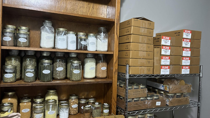 Image of spices in glass jars.