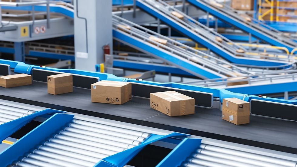 Cardboard boxes on a conveyor belt at a distribution center