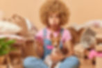 funny-european-woman-with-curly-hair-sits-on-floor-2022-12-21-15-02-49-utc.jpg