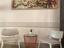 Elegant wait room for Medical Rooms & Co with sidetable