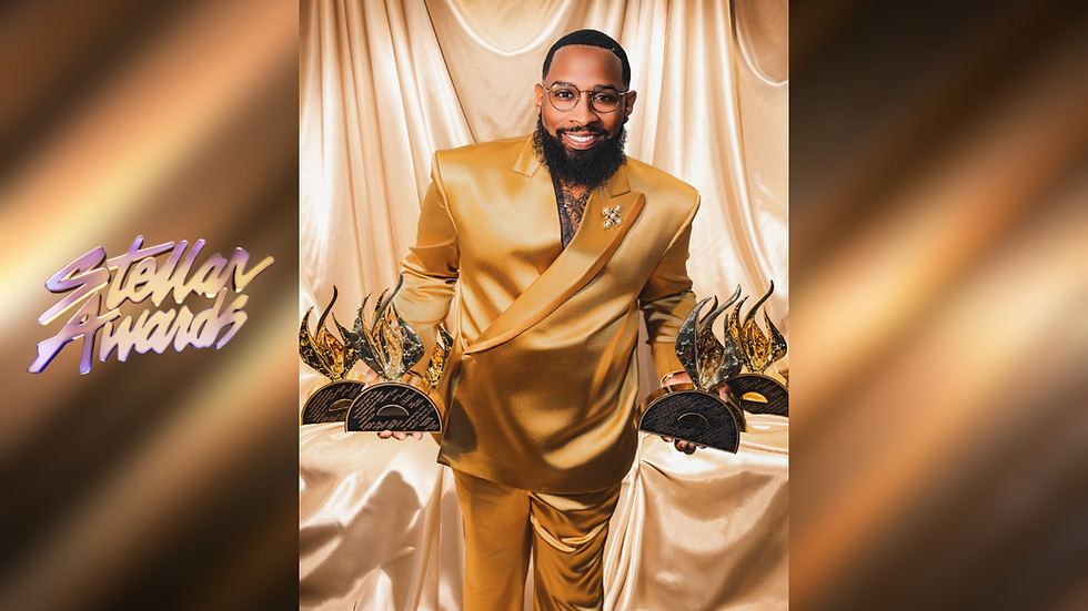 Pastor Mike Jr. shines at the 40th Annual Stellar Gospel Music Awards, proudly displaying the nine awards he won, including a record-setting fourth Artist of the Year trophy. (photo courtesy of Central City Productions)