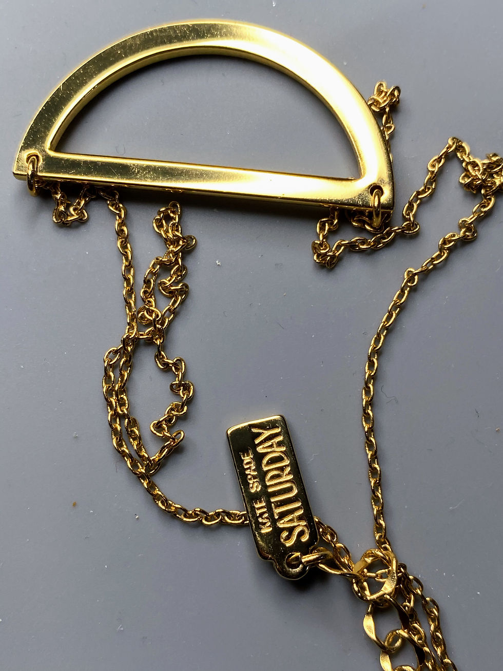 Thumbnail: Kate Spade Gold Toned Saturday Half Moon Necklace