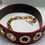 Thumbnail: Louis Vuitton Red Patent Leather Belt  Gold Eyelets & Chain  Designer Statement