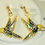 Thumbnail: Vintage Dario Hummingbird Dangle Earrings | Blue & Gold Enamel