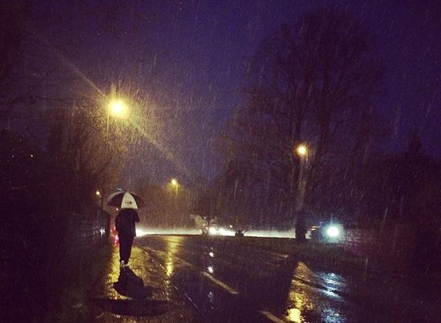 The man in the rain, surrey, uk
