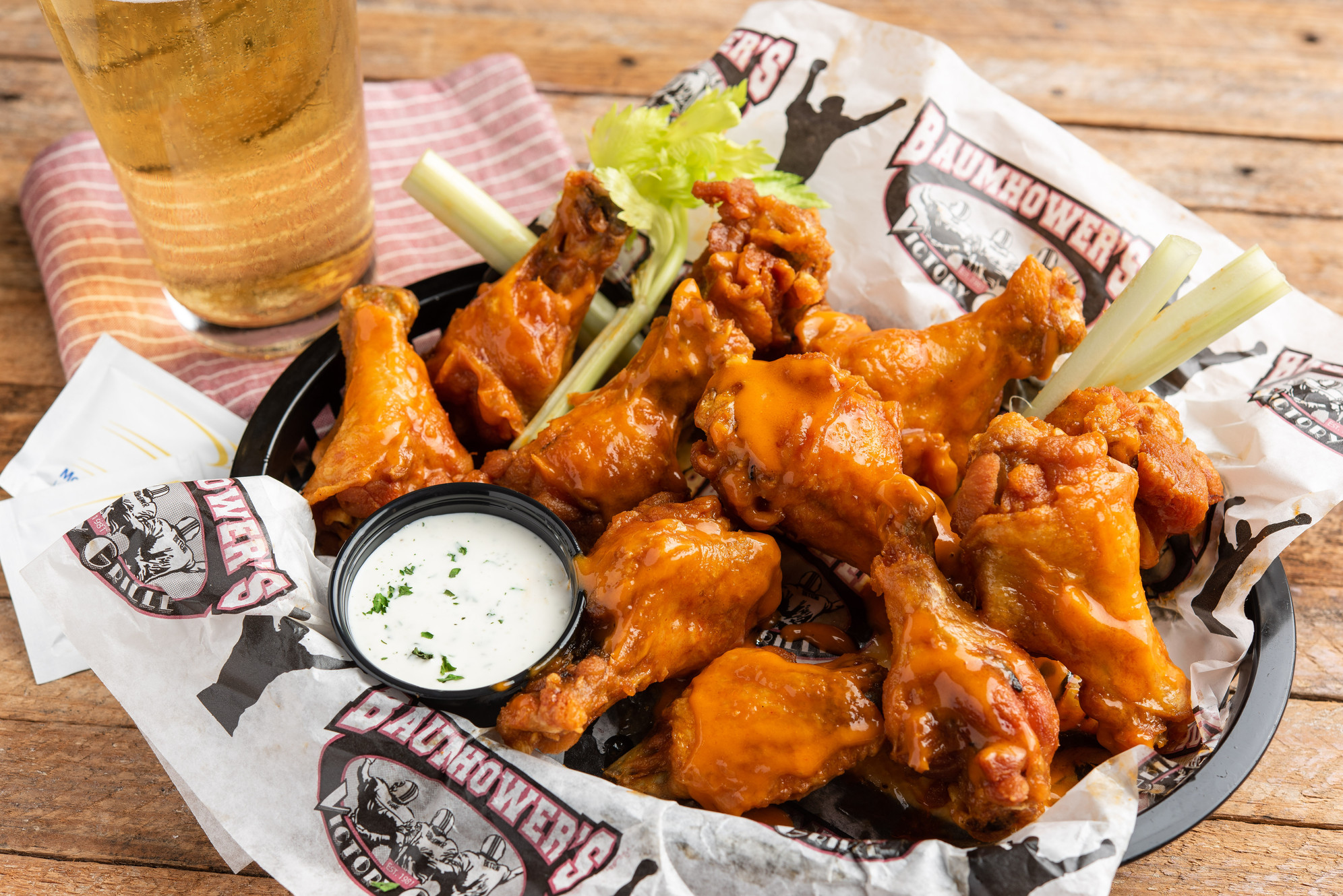 Baumhower's Victory Grille restaurant logo - View nutrition facts, calories, and macros for menu items at 2309 Memorial Pkwy SW Huntsville, AL 35801