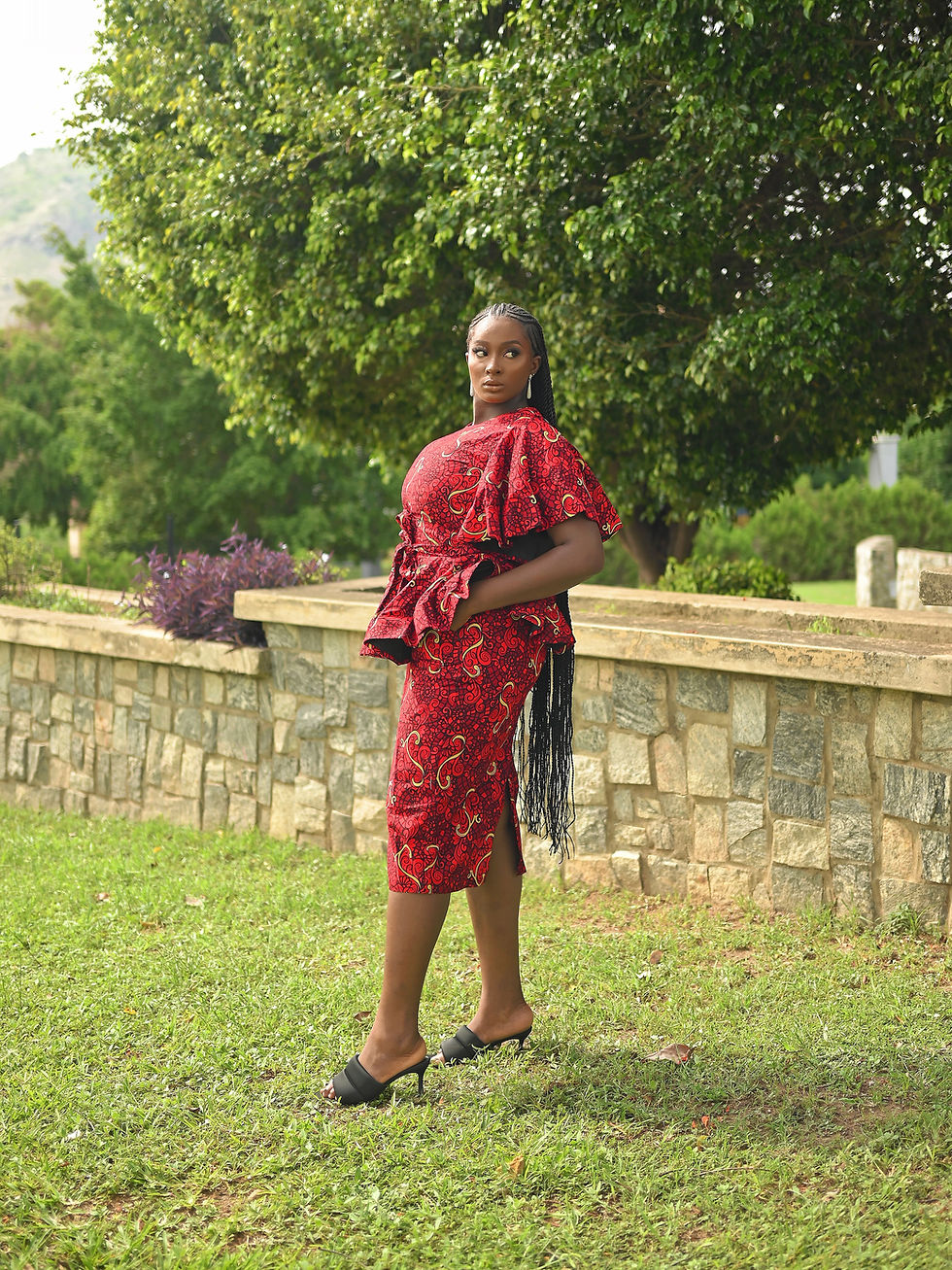 Thumbnail: Model in Kitenge Midi Pencil Skirt
