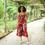 Thumbnail: Plus size model African print Corset top red highlighting cultural patterns