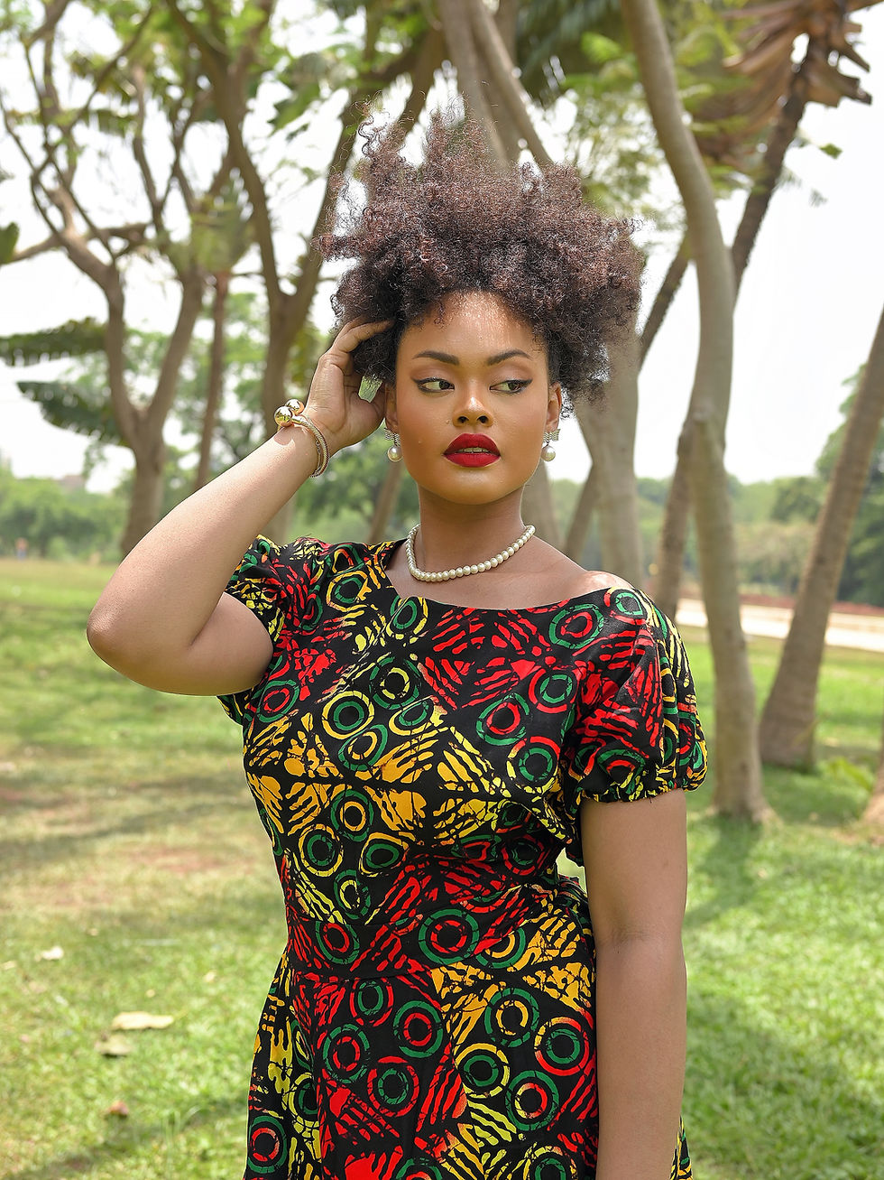 Stylish model wearing Red Pattern African Print flare dress for plus size.