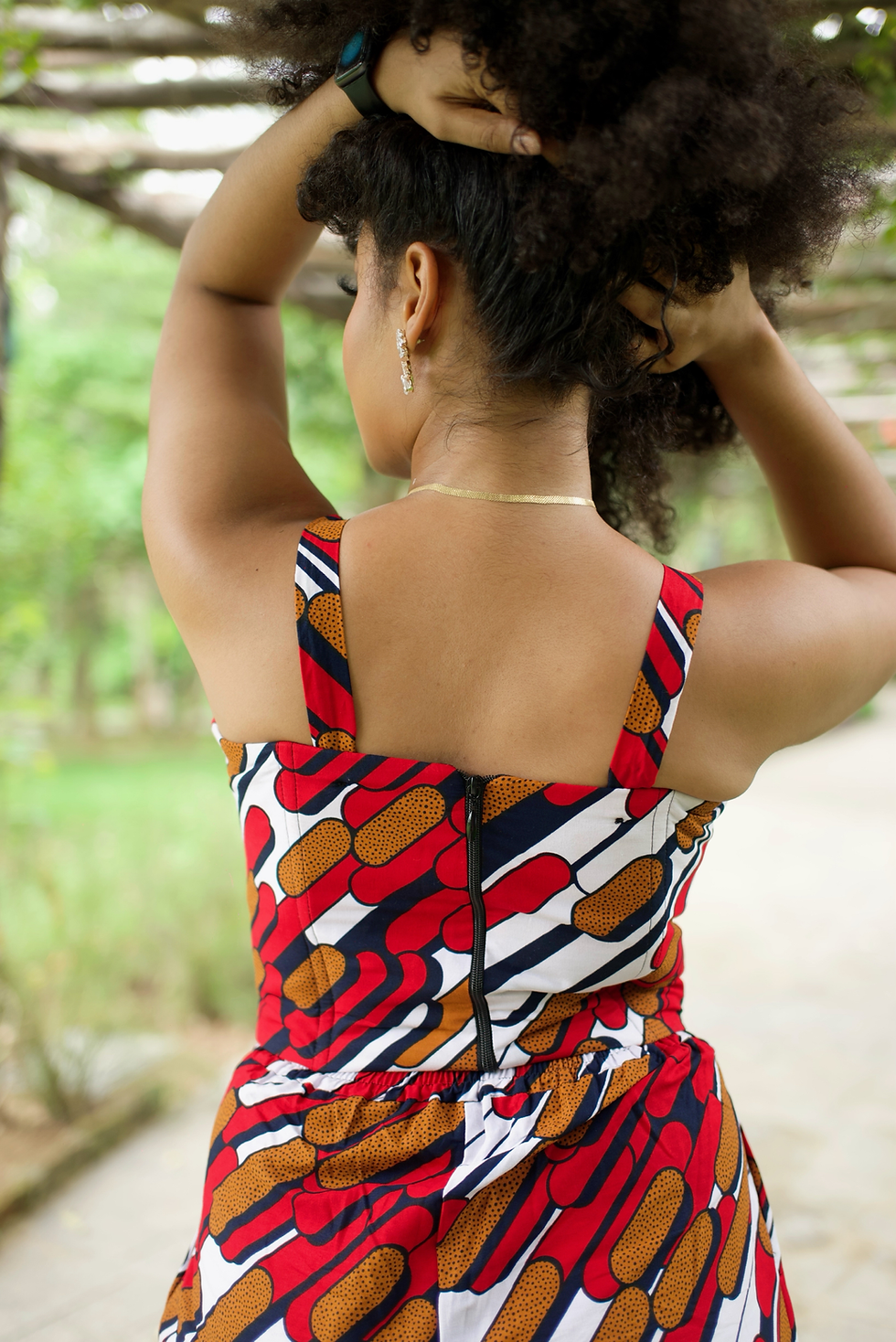 Thumbnail: Beautiful model in Ankara Corset top for outdoor look