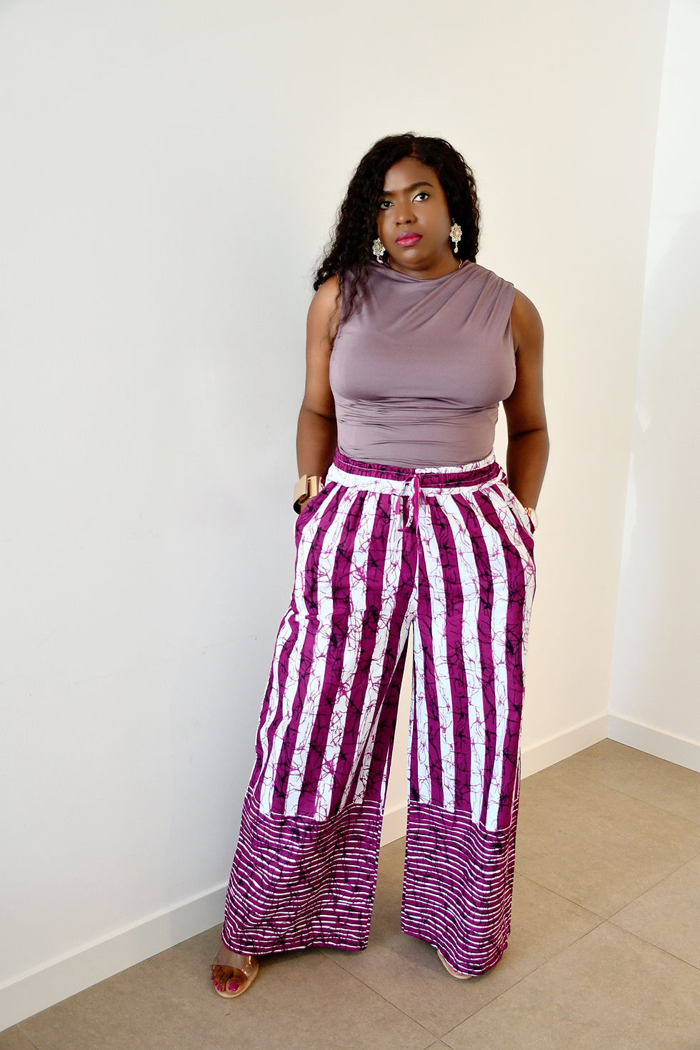 Thumbnail: African print trouser with purple pattern for formal occasion.