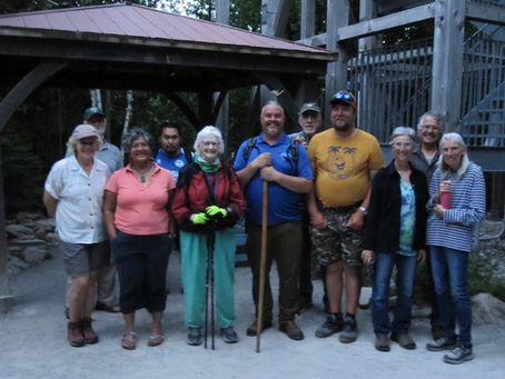 Caley Doran (centre) of Anishinaabe Cultural Experiences led a walk from the Parks Canada Visitor's Centre to the Little Dunk's Bay Lookout on July 16 as part of Summer in the Spirit.
