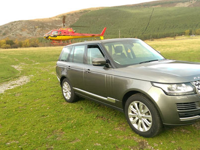 Meeting a client with one of our Range Rovers.jpg