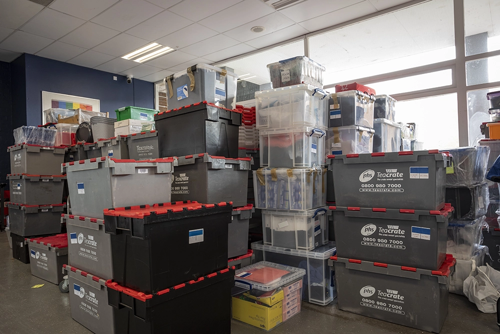 packing crates in a classroom