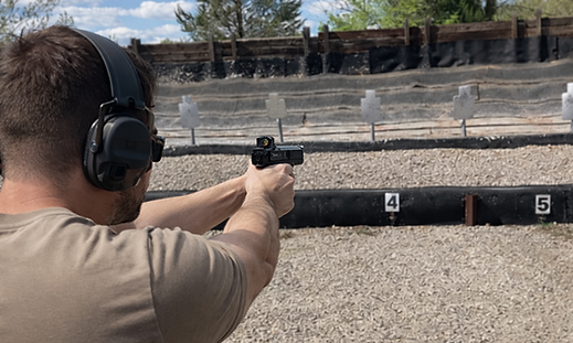 image of guy with MRD on pistol.png