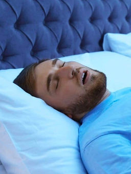 Photo of a man sleeping with his mouth open | Methal Dental Arts – Trusted Family, Cosmetic & Emergency Dentistry in Brooklyn, NY