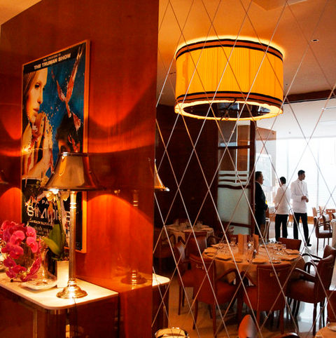 The Cipriani sign glows against the skyline, its sleek design reflecting the brand’s signature blend of Italian elegance and modern sophistication.