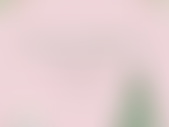 Pink background with the words "12 days of christmas: godly girl version day one" across it. snowflakes drift around a cup of cocoa and a christmas tree