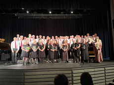 Mendip Male Voice Choir and Westfield voices pose for a photo