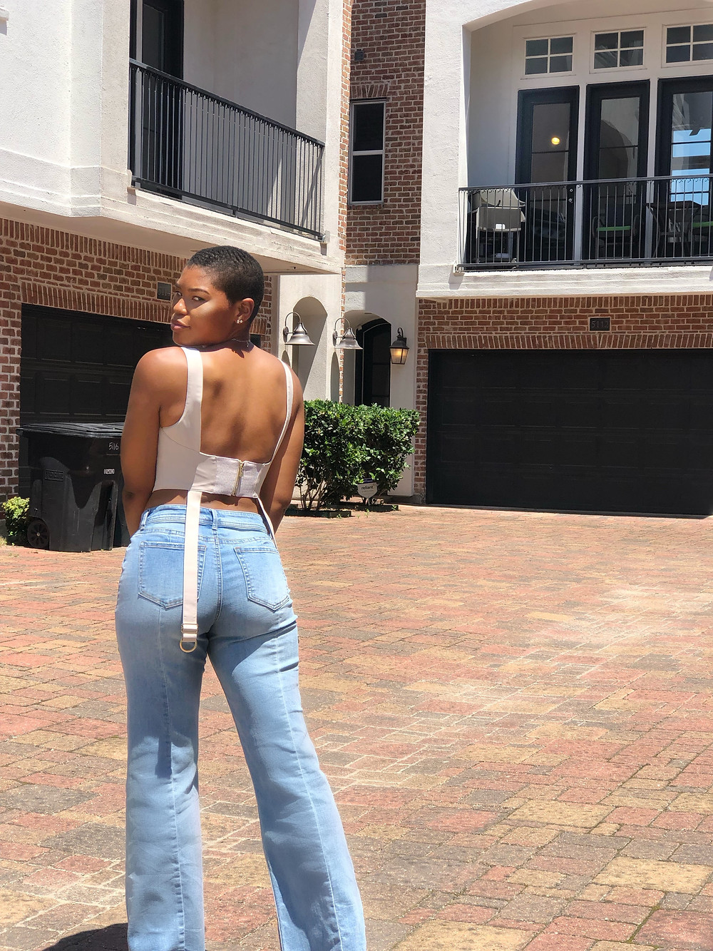 back view House of CB corset and jeans