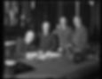 John Weeks and other statesmen standing around his desk as Weeks signs a document