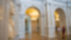 The Great Hall at the Library of Congress with guests looking at the sculpture.