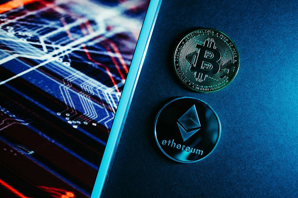 Close-up of Bitcoin and Ethereum coins on a blue surface beside a digital circuit image. The coins have engraved logos and text.