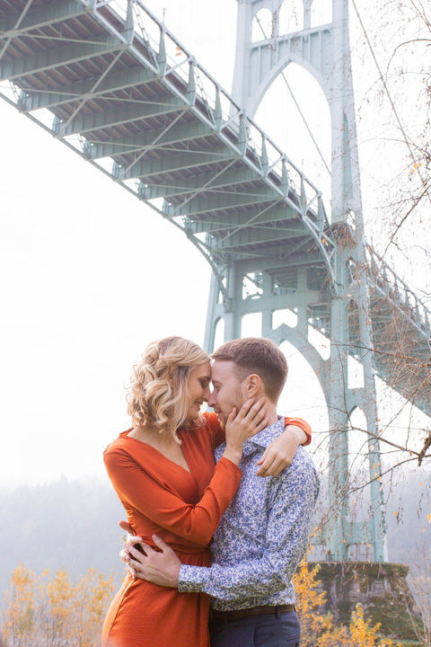 couple engagemnt photo session Portland, OR at St. John's Bridge