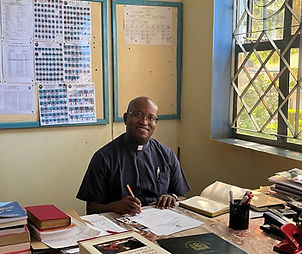 Fr. Pastor Mafikiri, the Rector of St. James Minor Seminary in his office