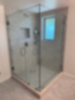 Glass shower cleaned and polished after move-in cleaning