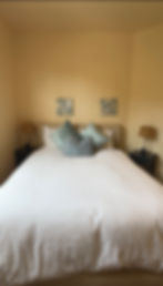 fresh and tidy Airbnb guest bedroom after cleaning
