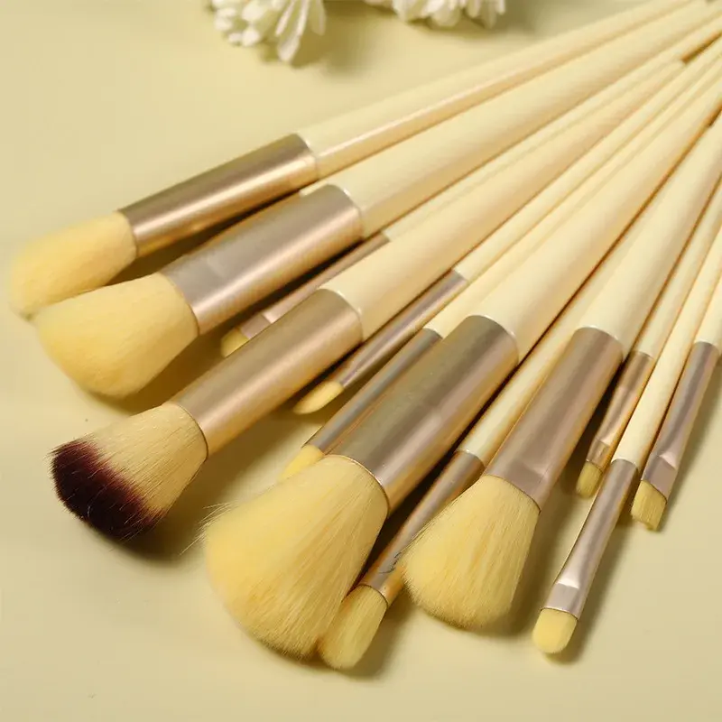 Thumbnail: Assortment of makeup brushes on a light background for cosmetic application.