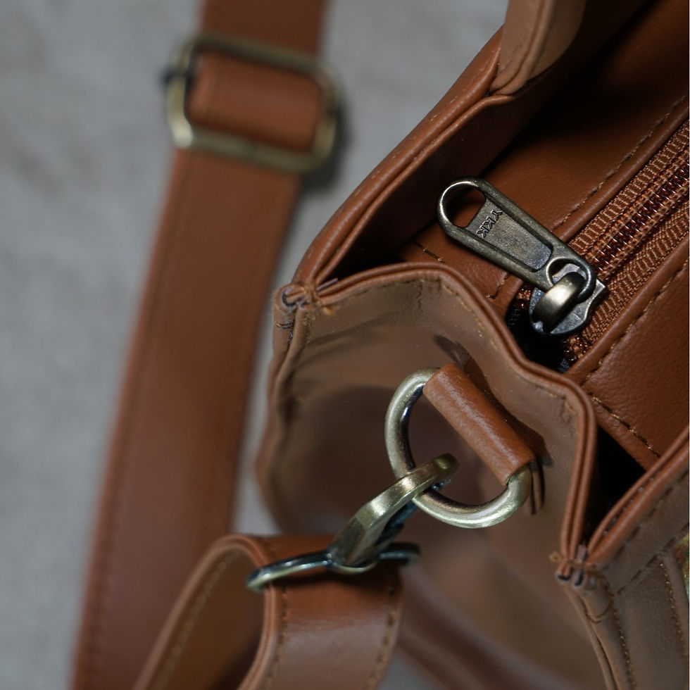 Thumbnail: Tan vegan leather sling bag with suede prints