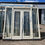 Thumbnail: Hardhouten dubbele deuren met zijlicht