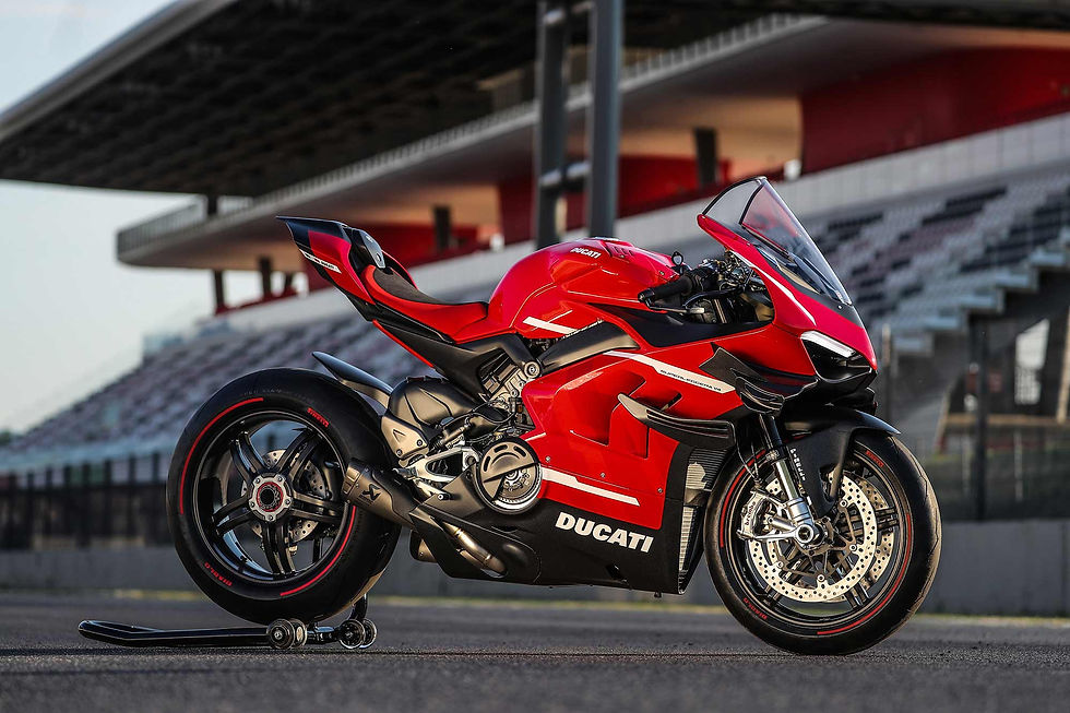 Ducati Superleggera V4 on back stand at track.
