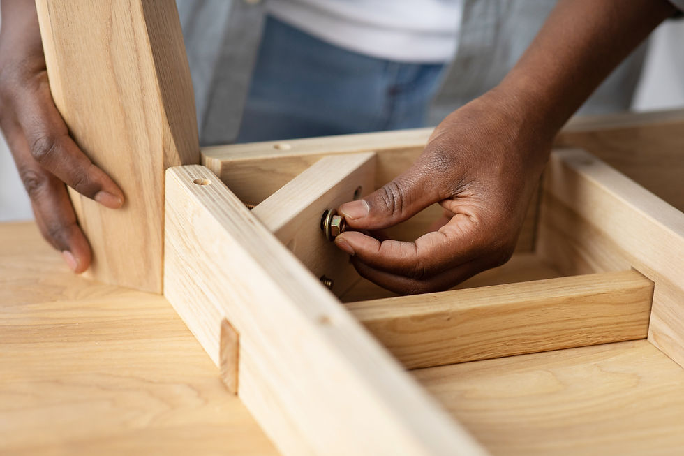 self-assembly-furniture-concept-black-man-screwin-2026-01-08-23-19-50-utc.jpg