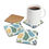 Thumbnail: Set of coasters featuring a colorful tropical leaf pattern with green, blue, and gold palm leaves on a white background.