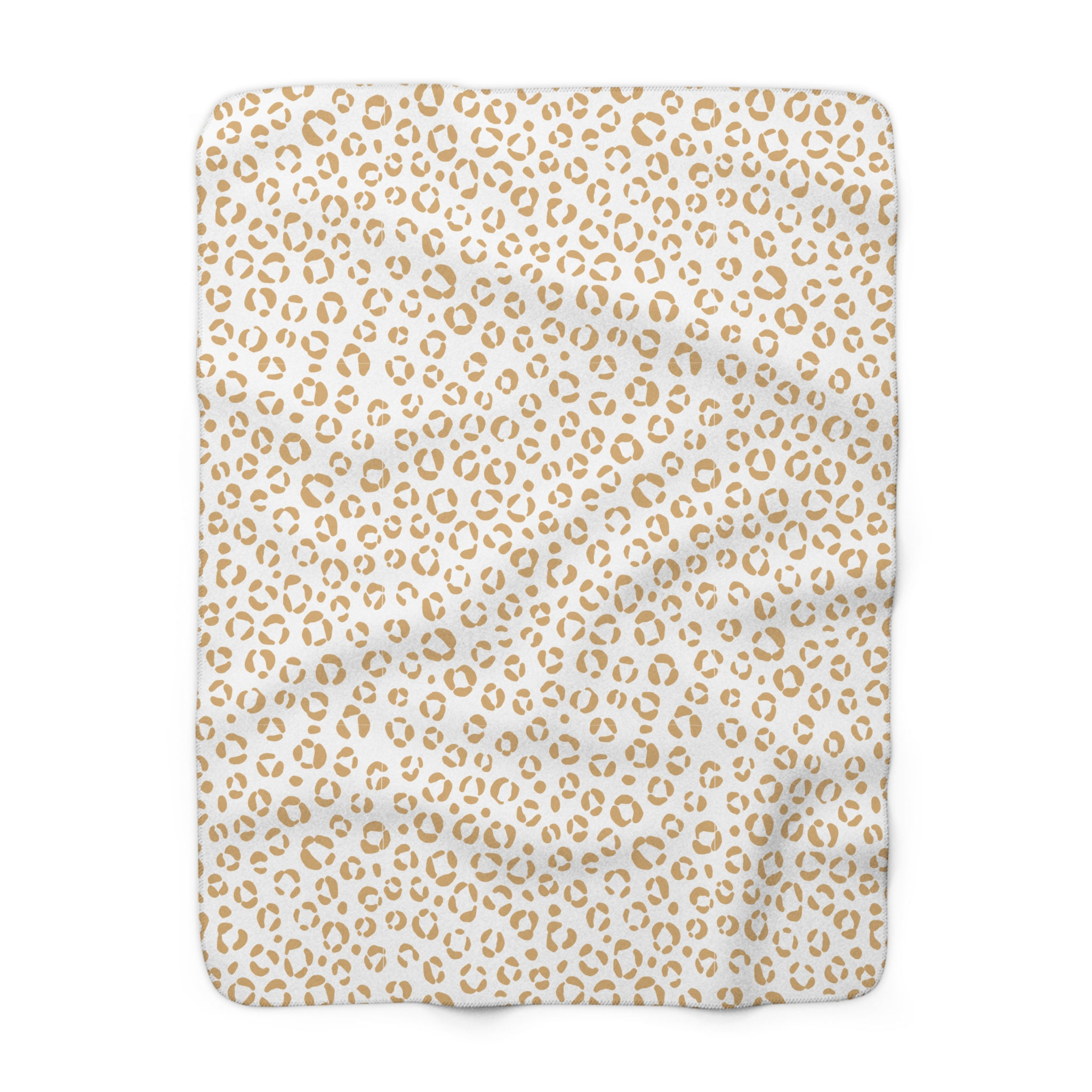 Soft sherpa blanket with mustard yellow leopard print patterns on a white background, ideal for cozy and stylish home decor.