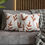 Thumbnail: Pillow cover with a brown leaf pattern on a white background and dotted accents.