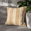 Thumbnail: Camel tone pillow cover with ivory vertical stripes and soft watercolor texture – neutral striped cushion cover.