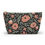 Thumbnail: Floral accessory pouch with blush pink flowers and green leaves on a black background – zippered botanical makeup bag.