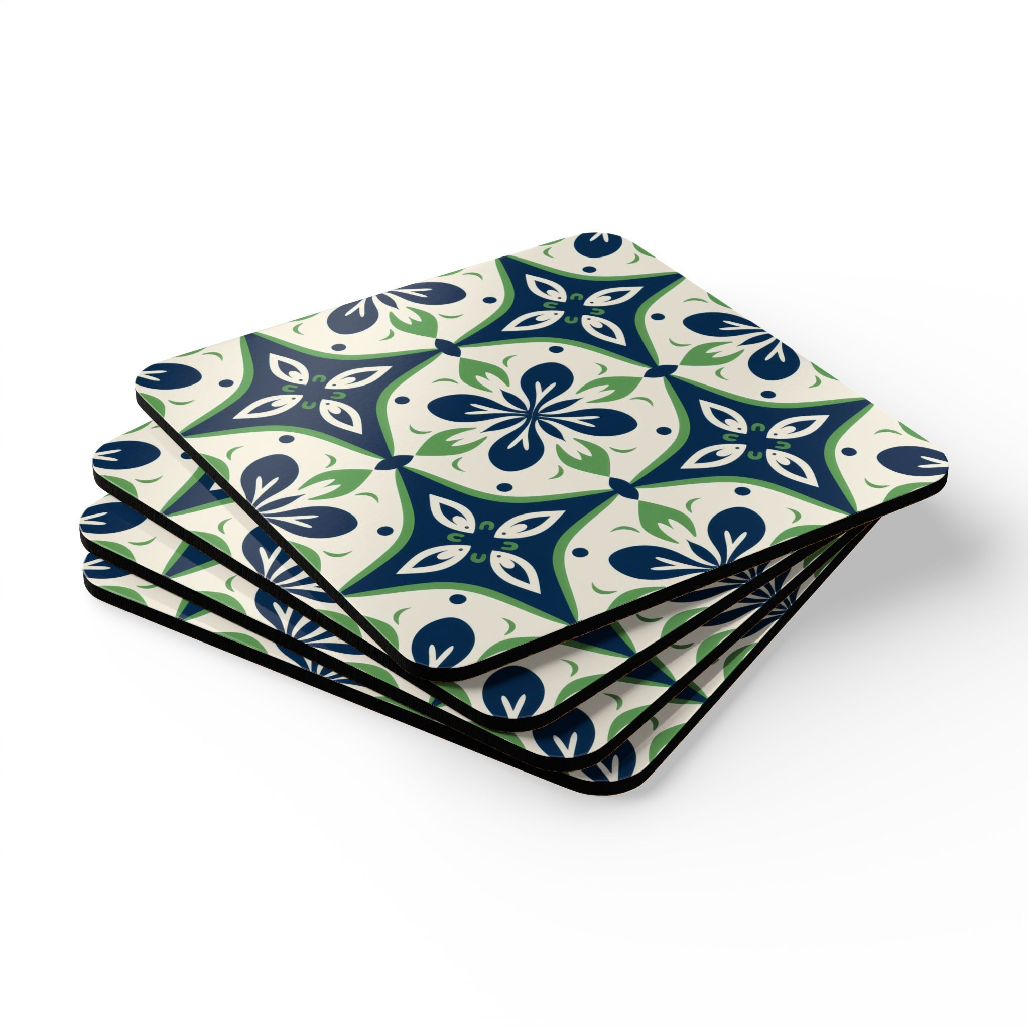 Set of four coasters featuring a Mediterranean tile pattern in navy blue, green, and cream, with an intricate floral-inspired